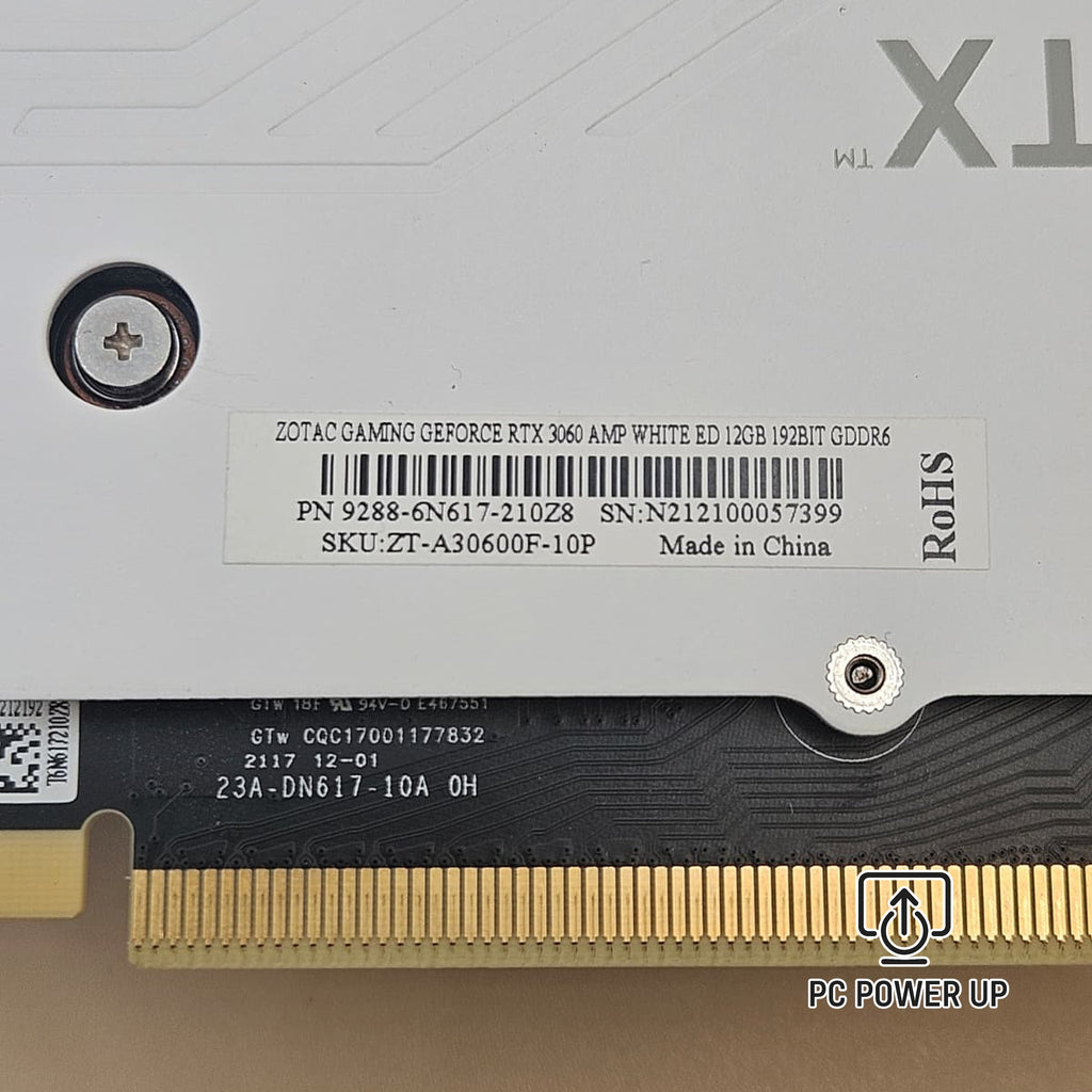 White graphics card label area with serial text and gold PCIe edge connector