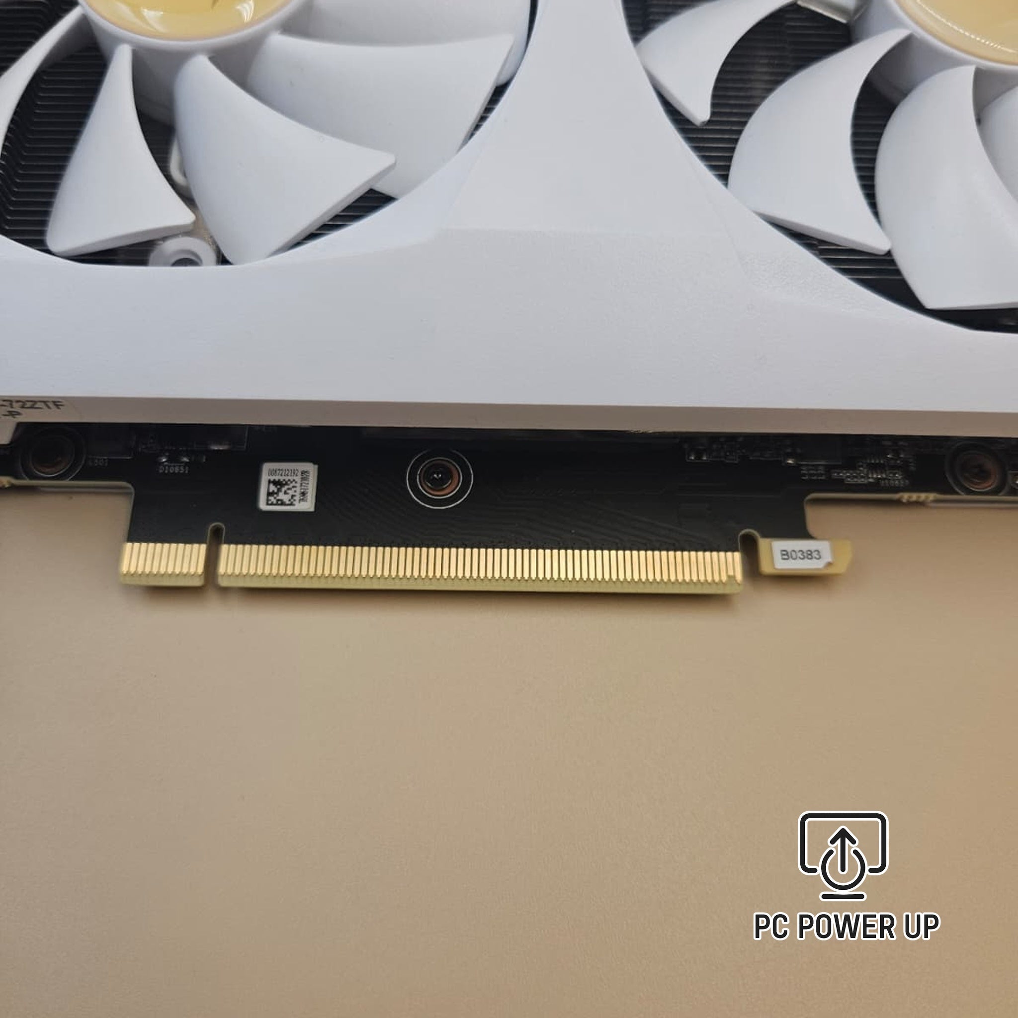 White graphics card PCIe edge connector with gold contacts and nearby ports