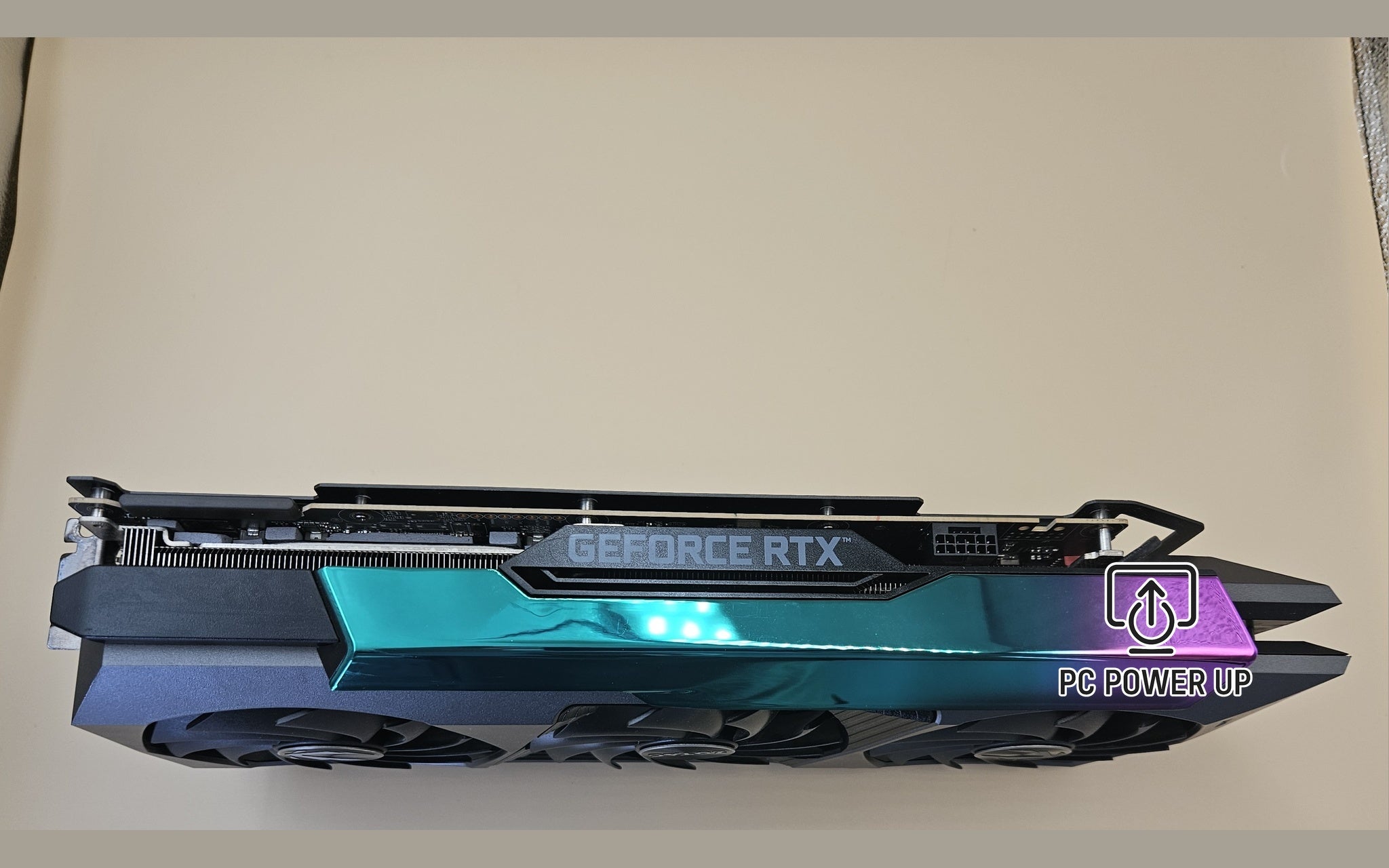 ZOTAC GeForce RTX graphics card showing front edge and teal-lit light strip