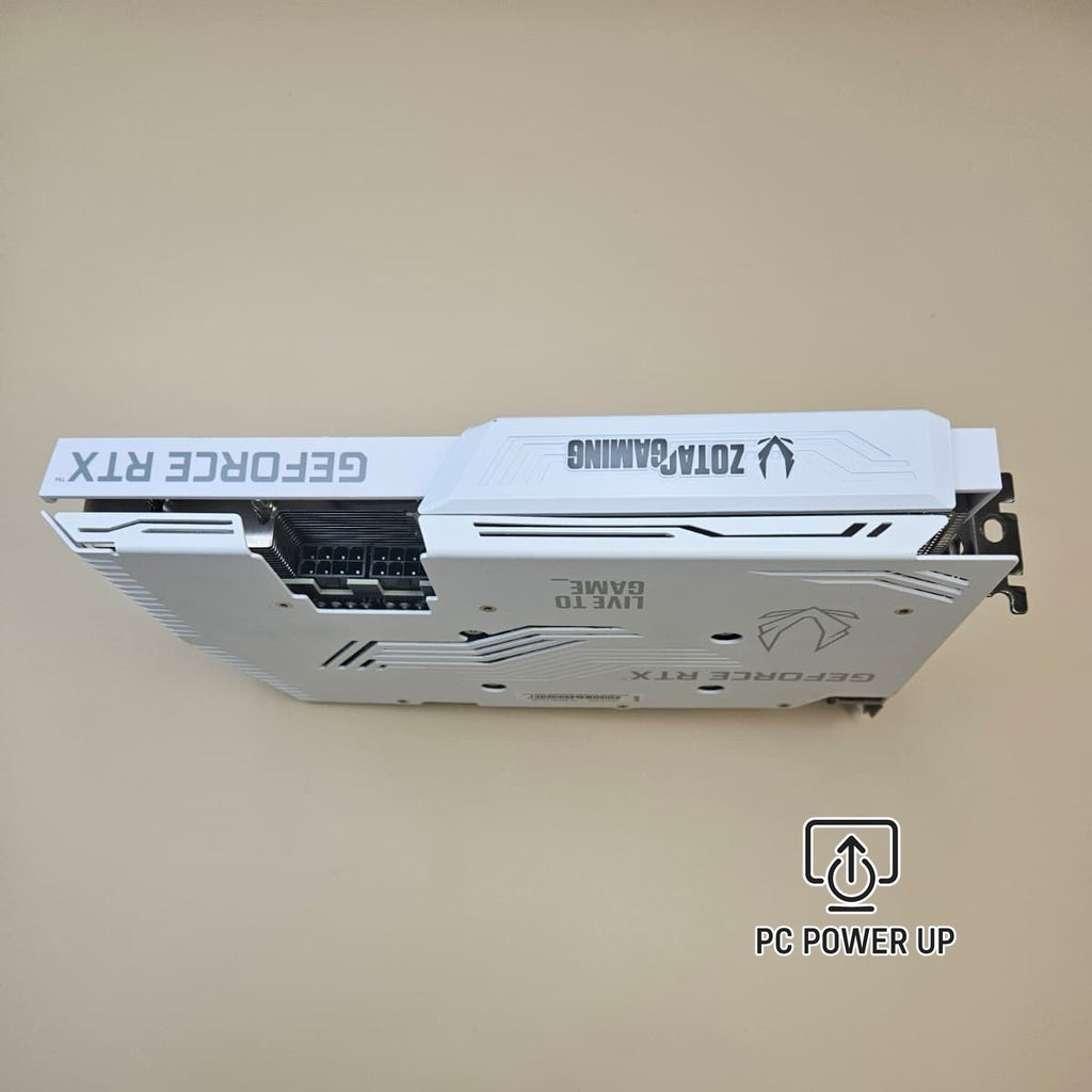 White ZOTAC graphics card backplate with cutouts and PCIe bracket