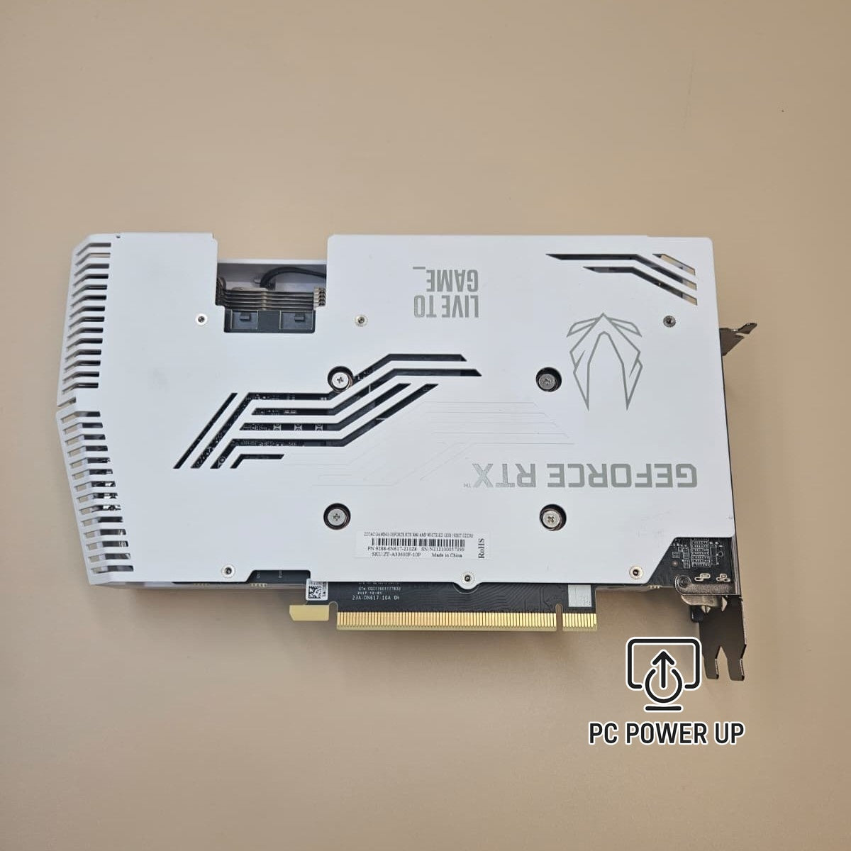 White graphics card rear with cooling vents and shielded heat sink sections